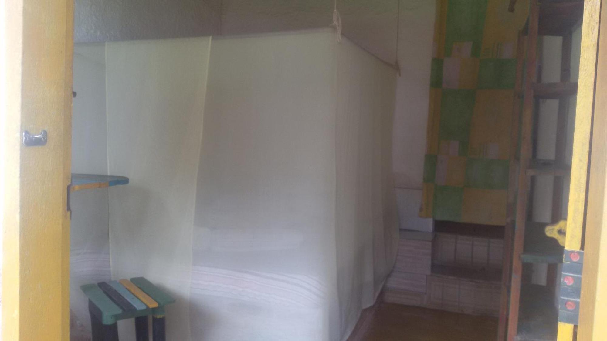 Hospedaria Cumuruxatiba Habitación foto
